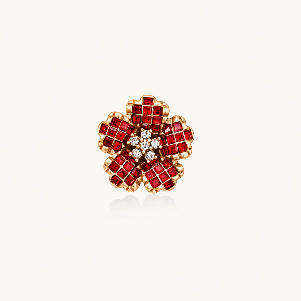 Gold-plated brass ring with red zirconia petals & crystal center in dimensional floral design