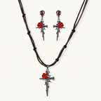 Gothic jewelry set with dark metal thorny cross pendants featuring red enamel roses and matching red crystal earrings