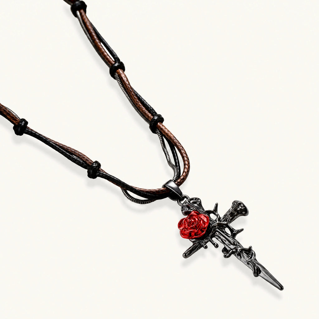 Gothic jewelry set with dark metal thorny cross pendants featuring red enamel roses and matching red crystal earrings