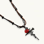 Gothic jewelry set with dark metal thorny cross pendants featuring red enamel roses and matching red crystal earrings